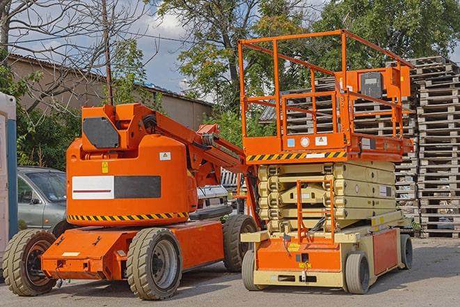 warehouse forklifts transporting goods in Belle Glade